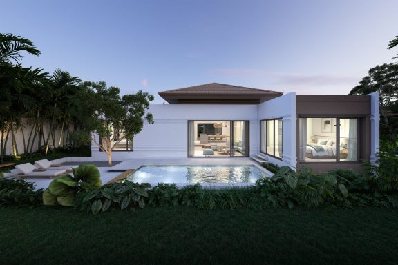 Maison moderne avec piscine, jardin et architecture contemporaine au coucher du soleil.