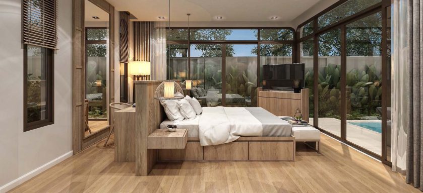 Chambre moderne avec lit king-size, grandes fenêtres et accès à une piscine extérieure.
