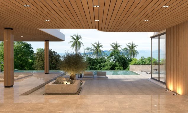 Intérieur moderne avec parquet, vue sur la piscine et des palmiers en arrière-plan.